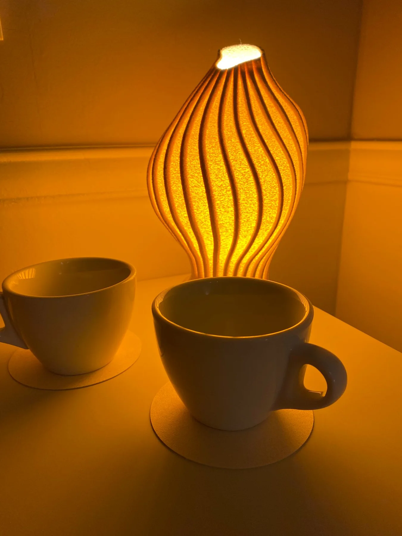 VLIV Luma lamp next to coffee cups