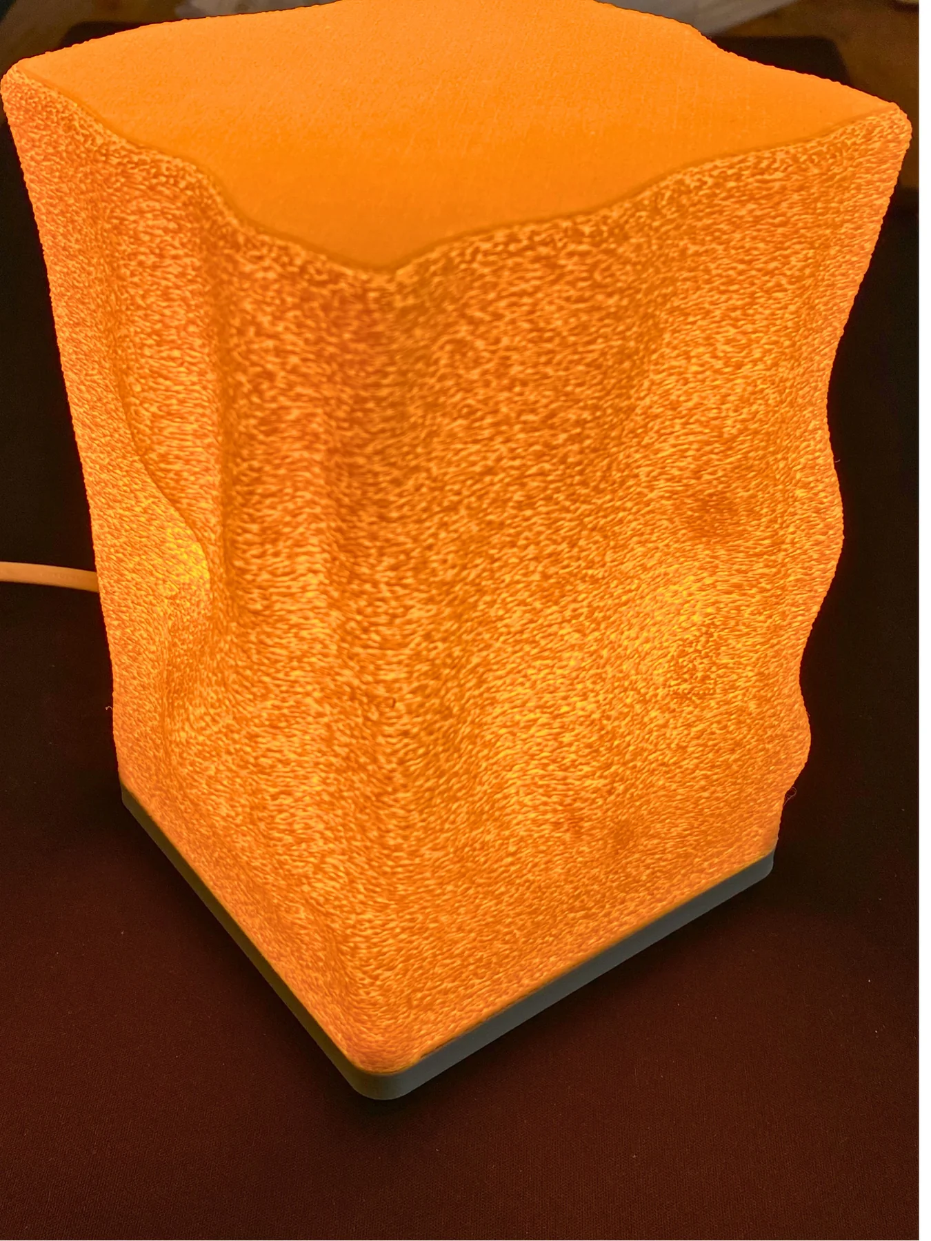 Close-up of the glowing VLIV Wave lamp